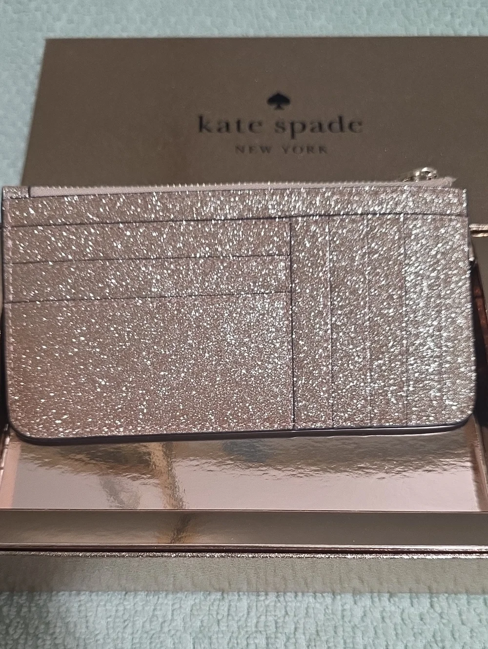 Kate Spade New York rose gold glitter cardholder clutch